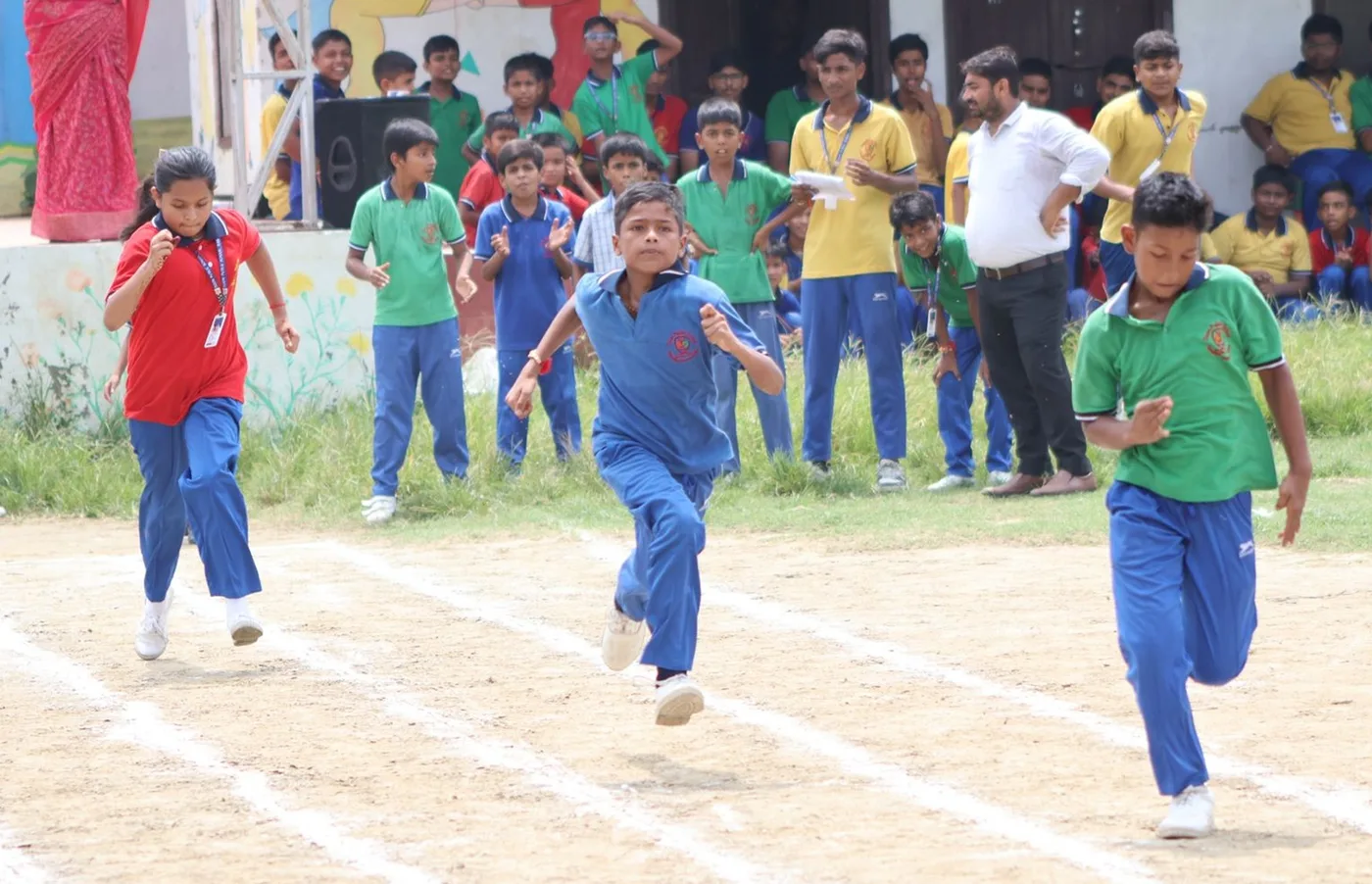 Students racing on the school ground on National Sports Day